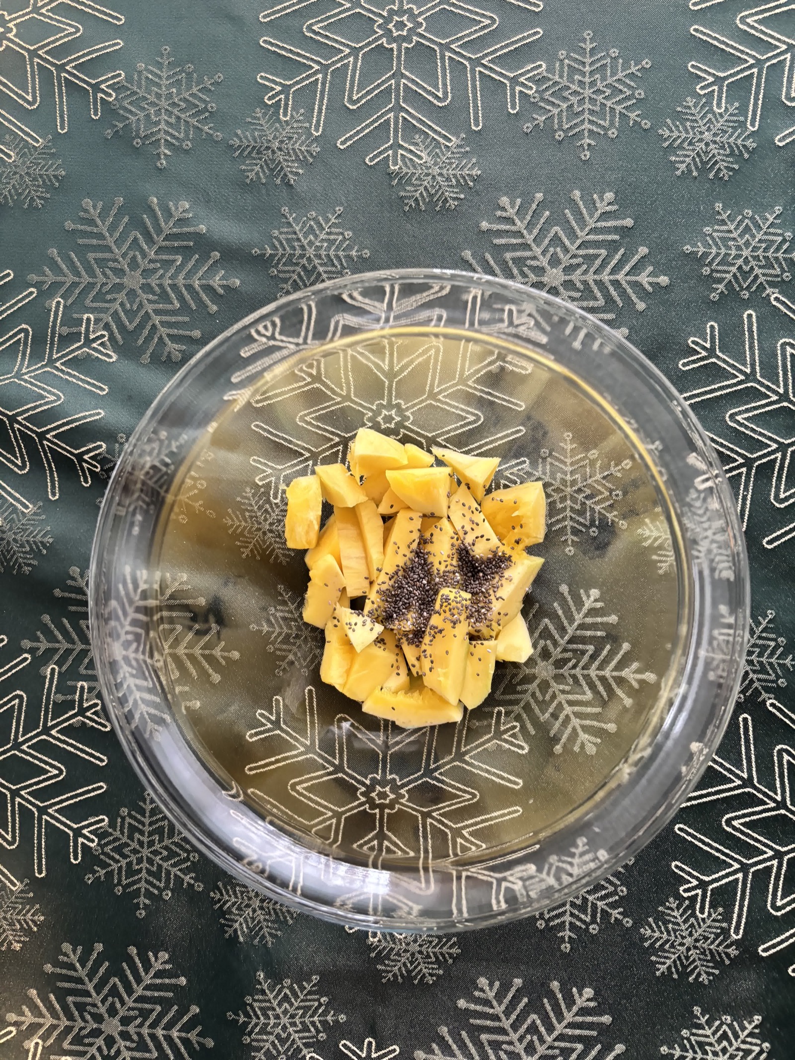 Mango pieces with chia seeds added.